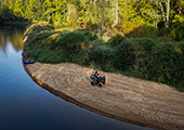 Technician Collecting Water Samples With ATV and Kayak